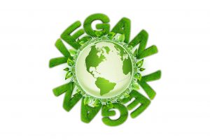 ビーガンの文字と緑の地球・世界ビーガンデーのイメージ